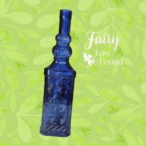 Vintage cobalt blue glass bottle